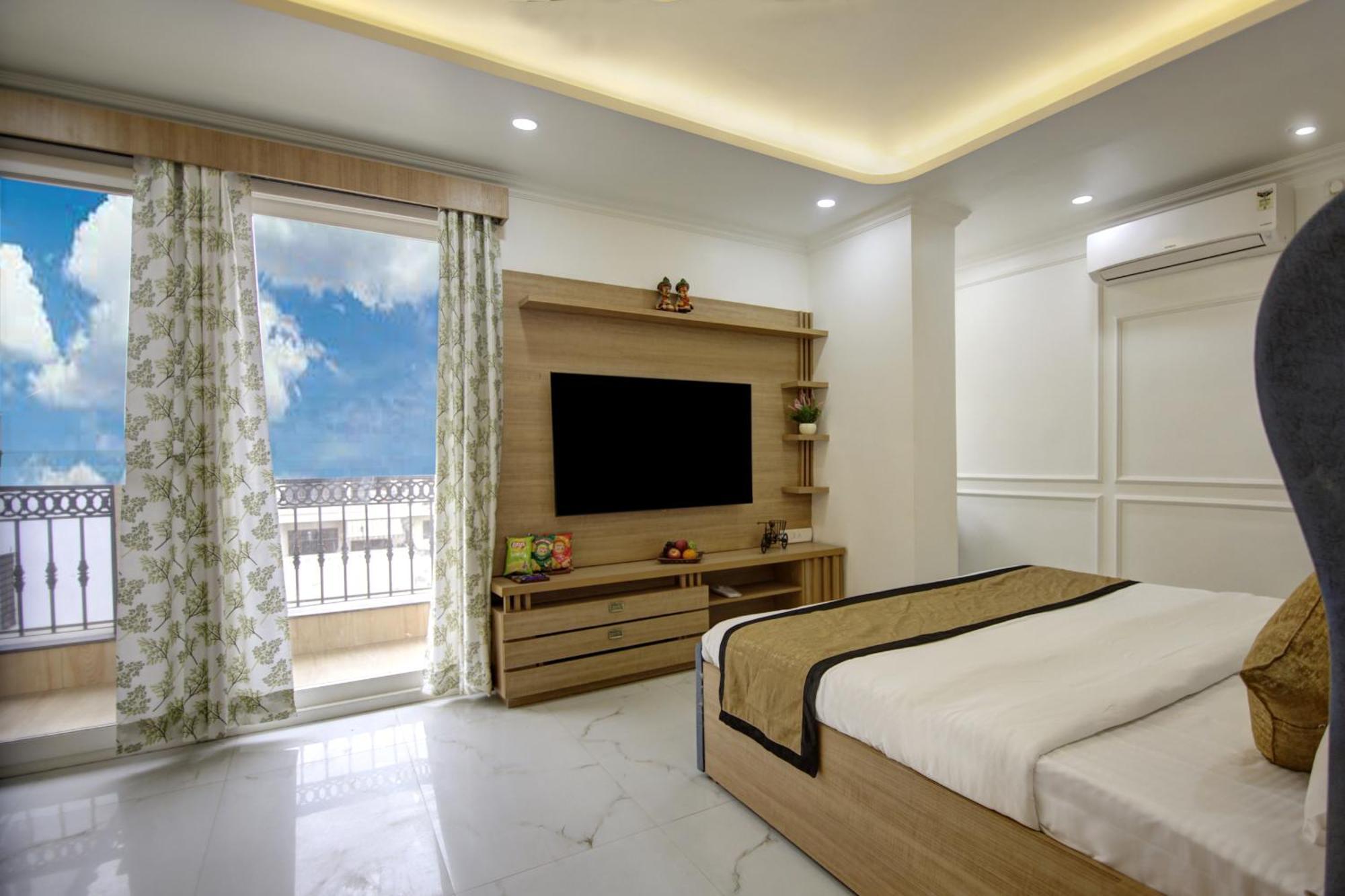 グルガウン Anandam Club Houseアパートホテル エクステリア 写真